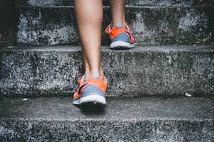 Person climbing steps